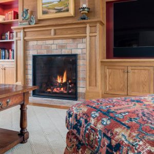 living room with fireplace - historic estate interior design renovation by Gale Michaud Interiors