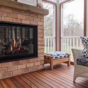 Gale Michaud Interiors - Historic Estate Interior Design Project - fireplace in enclosed outside living area